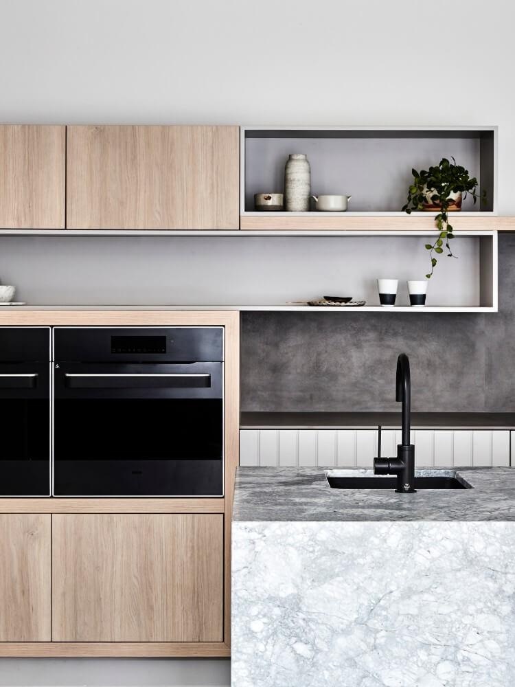 Contemporary Kitchen Utilising Light Stone And Cabinetry