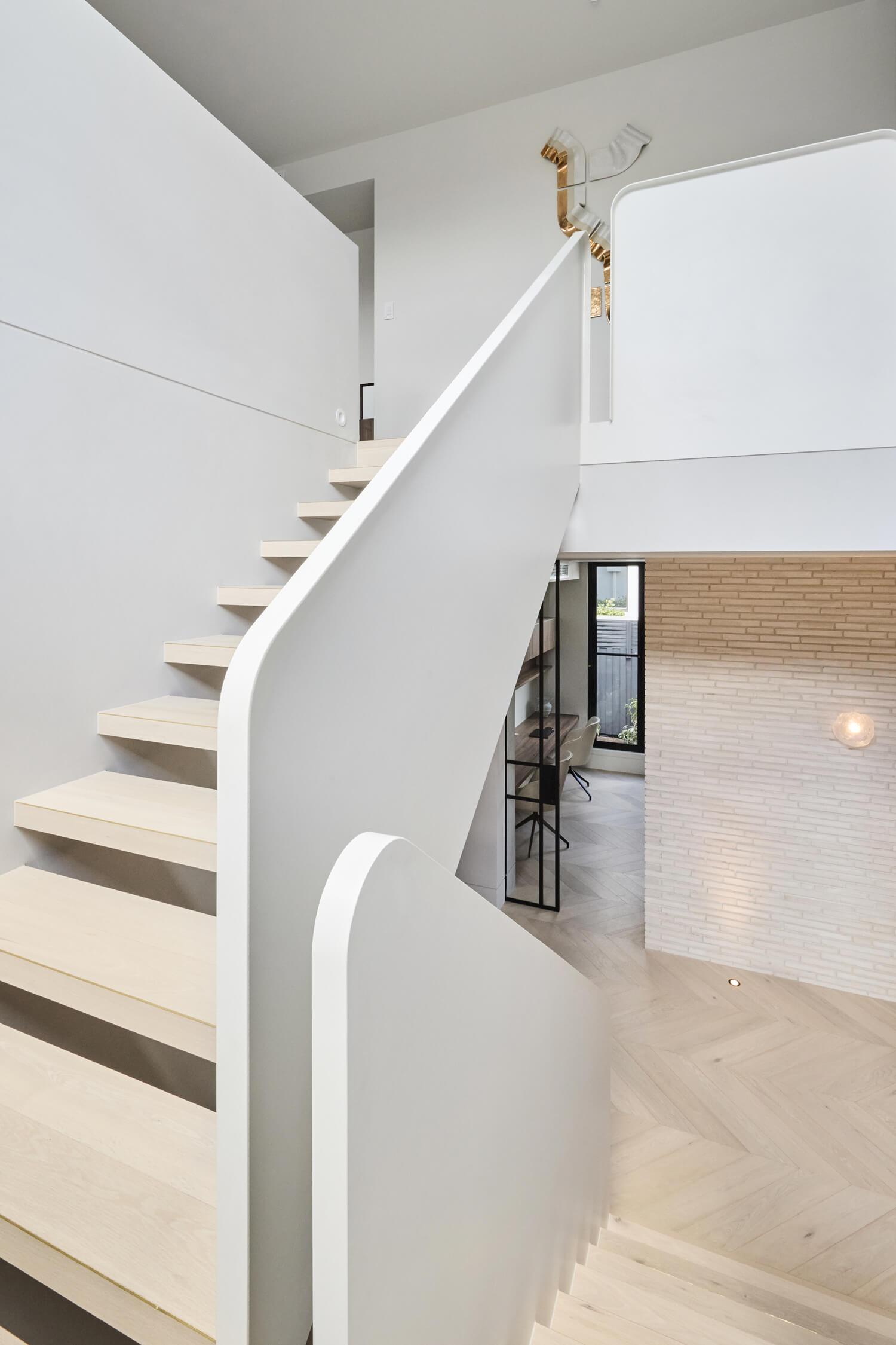 Architecturally designed staircase in a custom design home by Thomas Archer