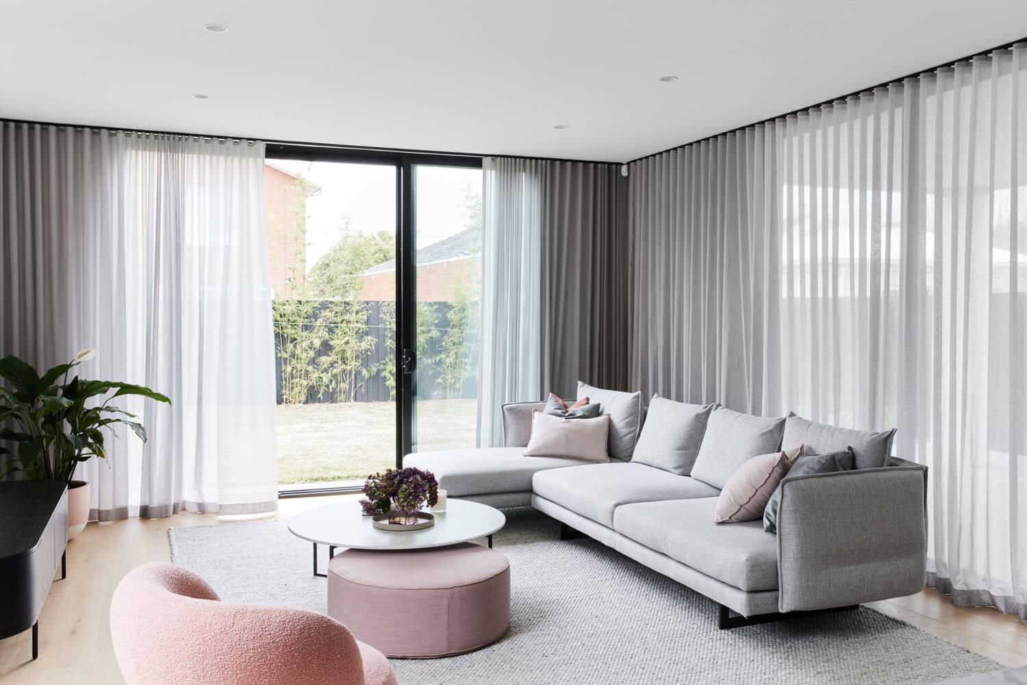 Floor To Ceiling Windows Enhance The Light Interior Styling In Living Room