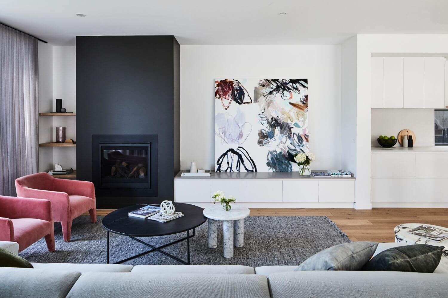 Contemporary Fireplace, Furniture And Artwork In Living Room