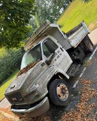 COORS BUYS JUNK CARS