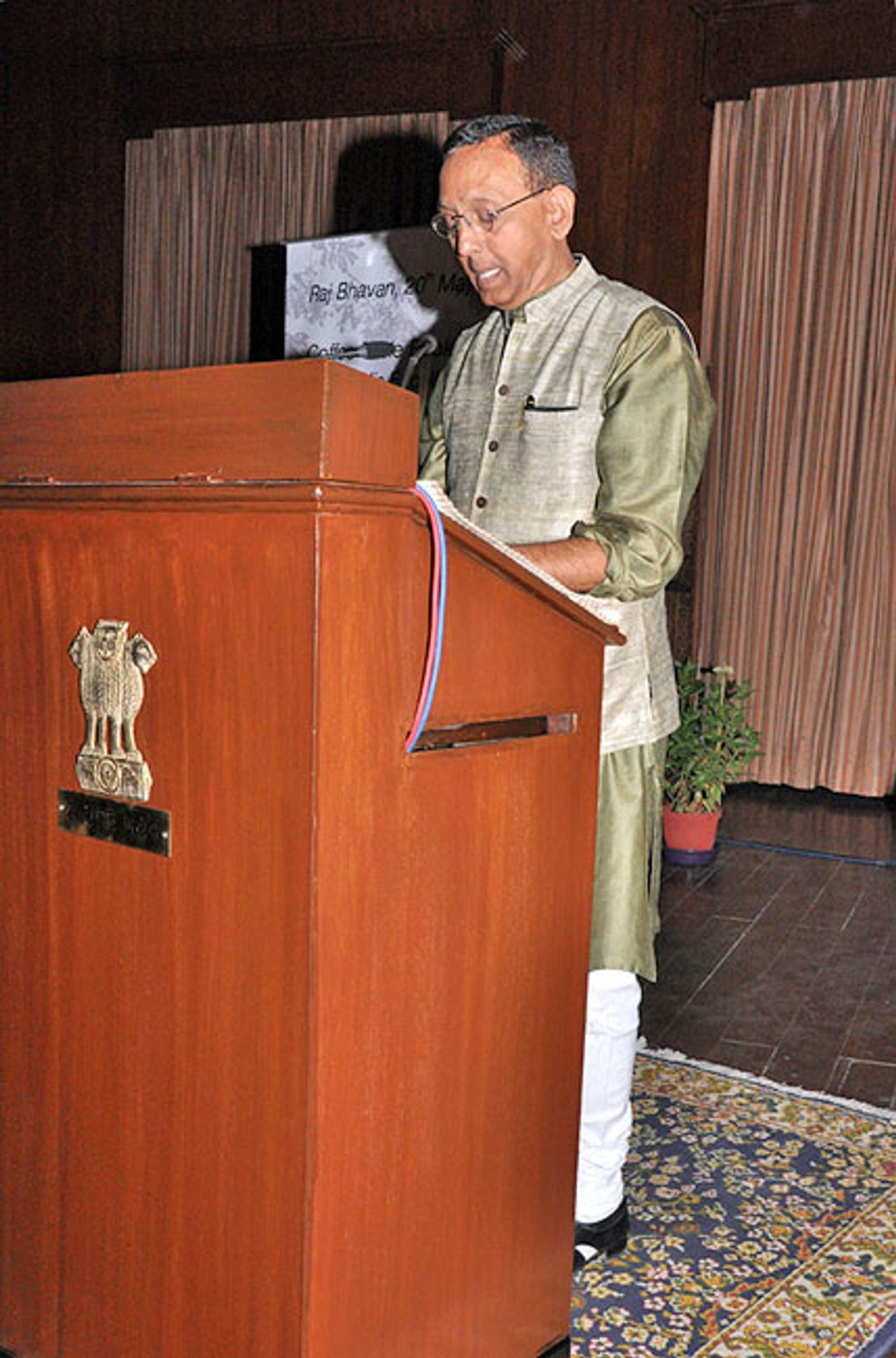 Delivering a speech at Raj Bhavan