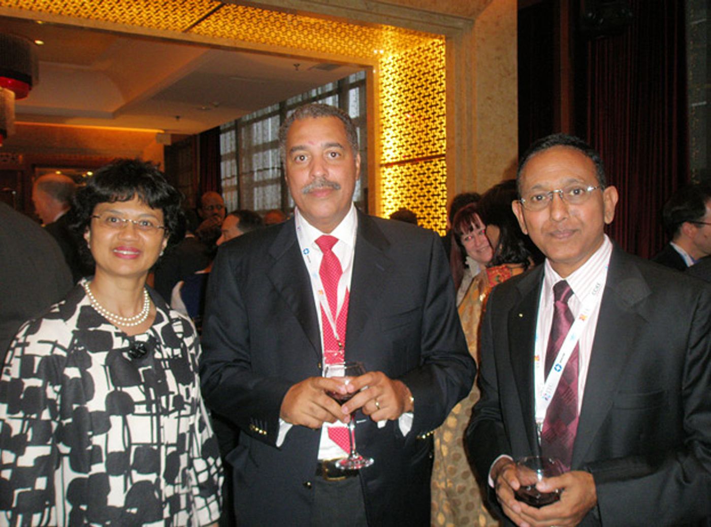 With S. African Minister Ms. Tina Joemat-Pettersson and banker Mr. André Soumah