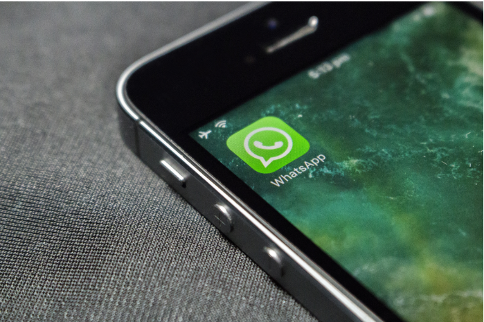 Phone screen with WhatsApp logo representing how to create WhatsApp Business API account