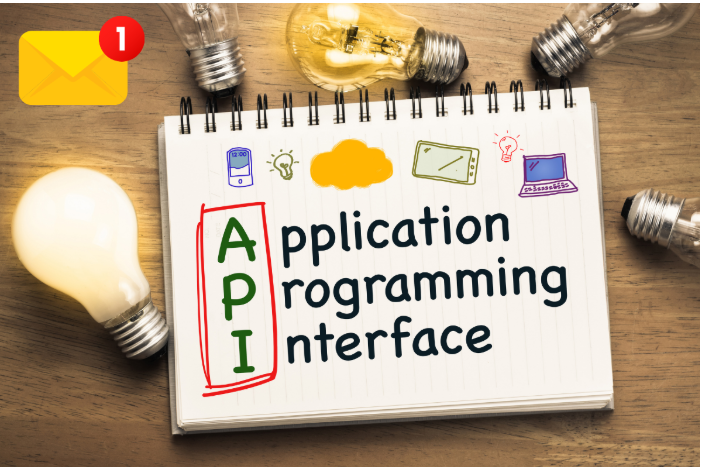 Notebook with “application programming interface” text, visualizing what SMS API is and how SMS API works
