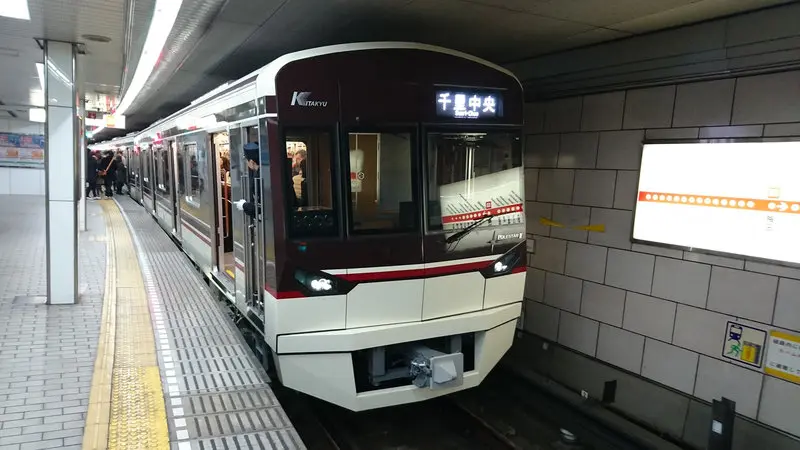 Kita-Osaka Kyuko 9000 series train 9003F at Umeda Station in Osaka