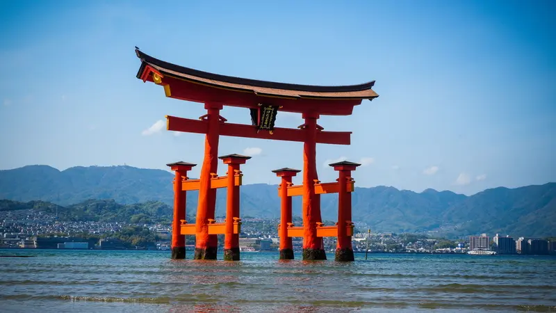 Great torii gate of Itsukushima Shrine standing in the sea in Hiroshima, Japan