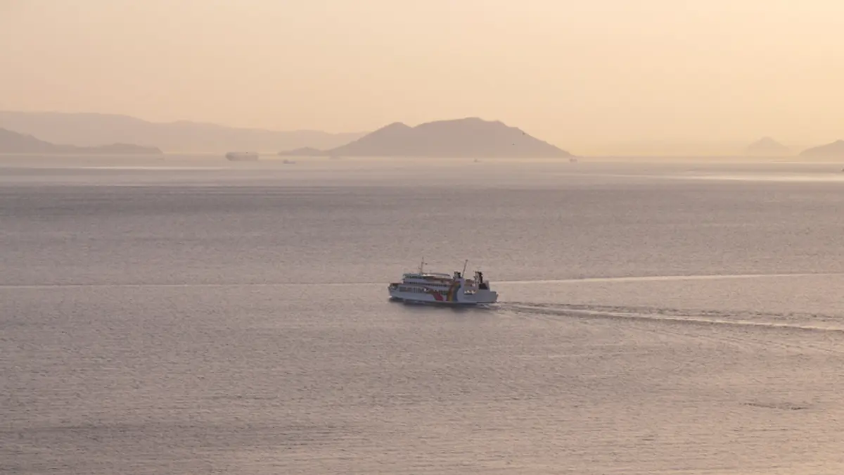 Ferry and islands at sunset viewed from Ikeda Port on Shodoshima, Kagawa, Japan