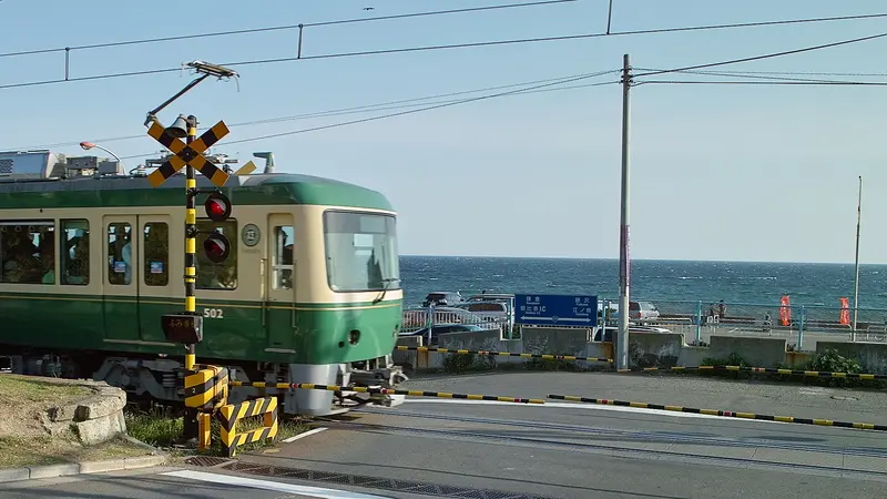 Enoden train beside the sea at Shichirigahama in Kamakura