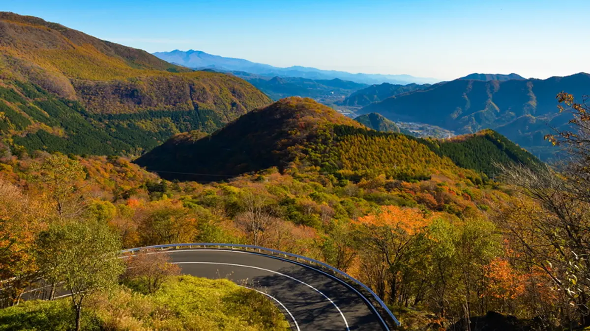 Autumn foliage and a winding road on Irohazaka in Nikko