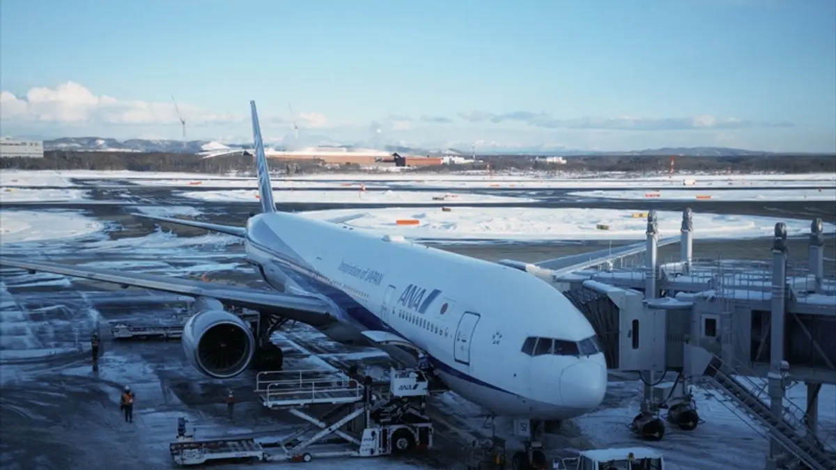 ANA aircraft at snow-covered New Chitose Airport in Hokkaido