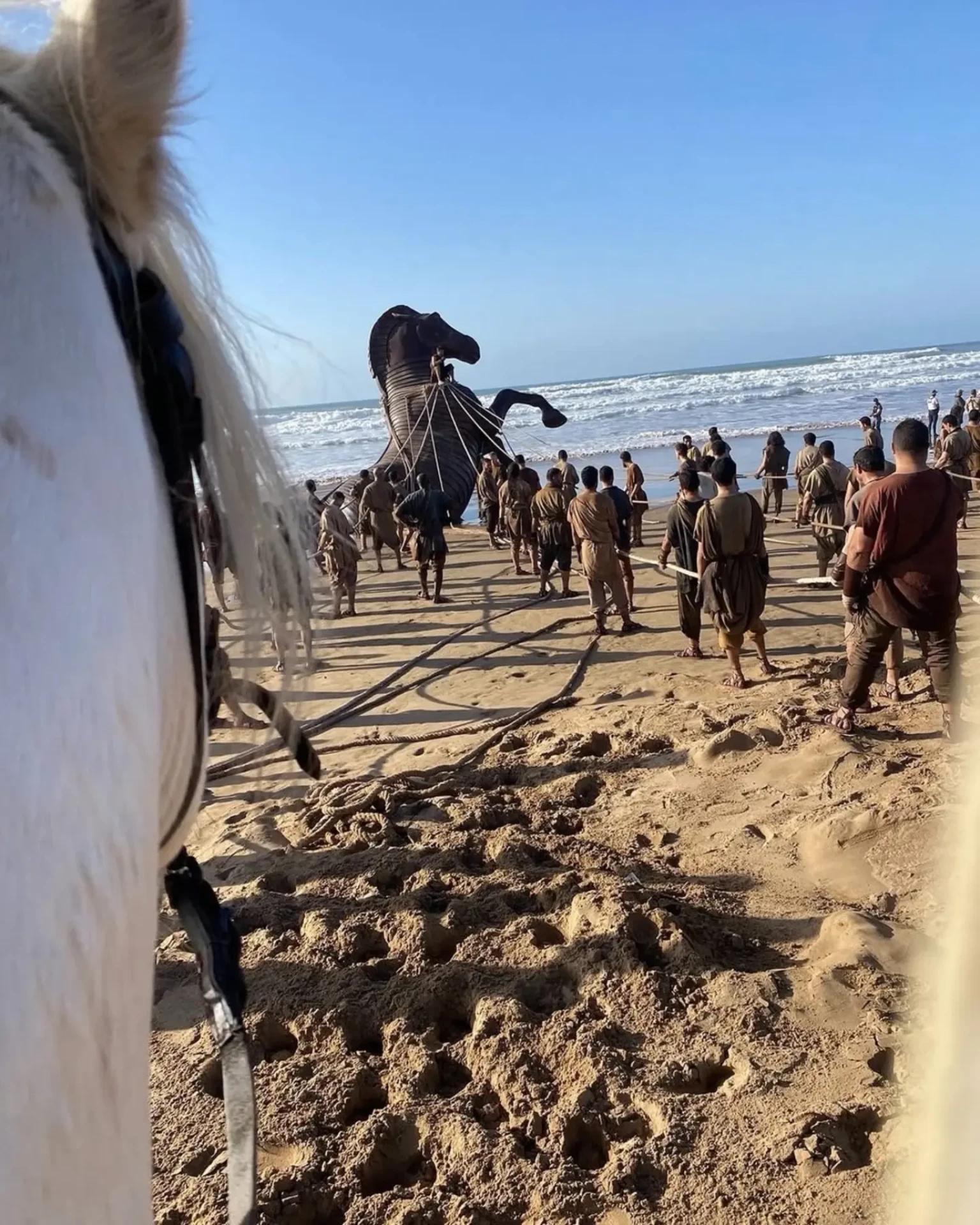 The Trojan Horse prop being hauled up a Moroccan beach during filming