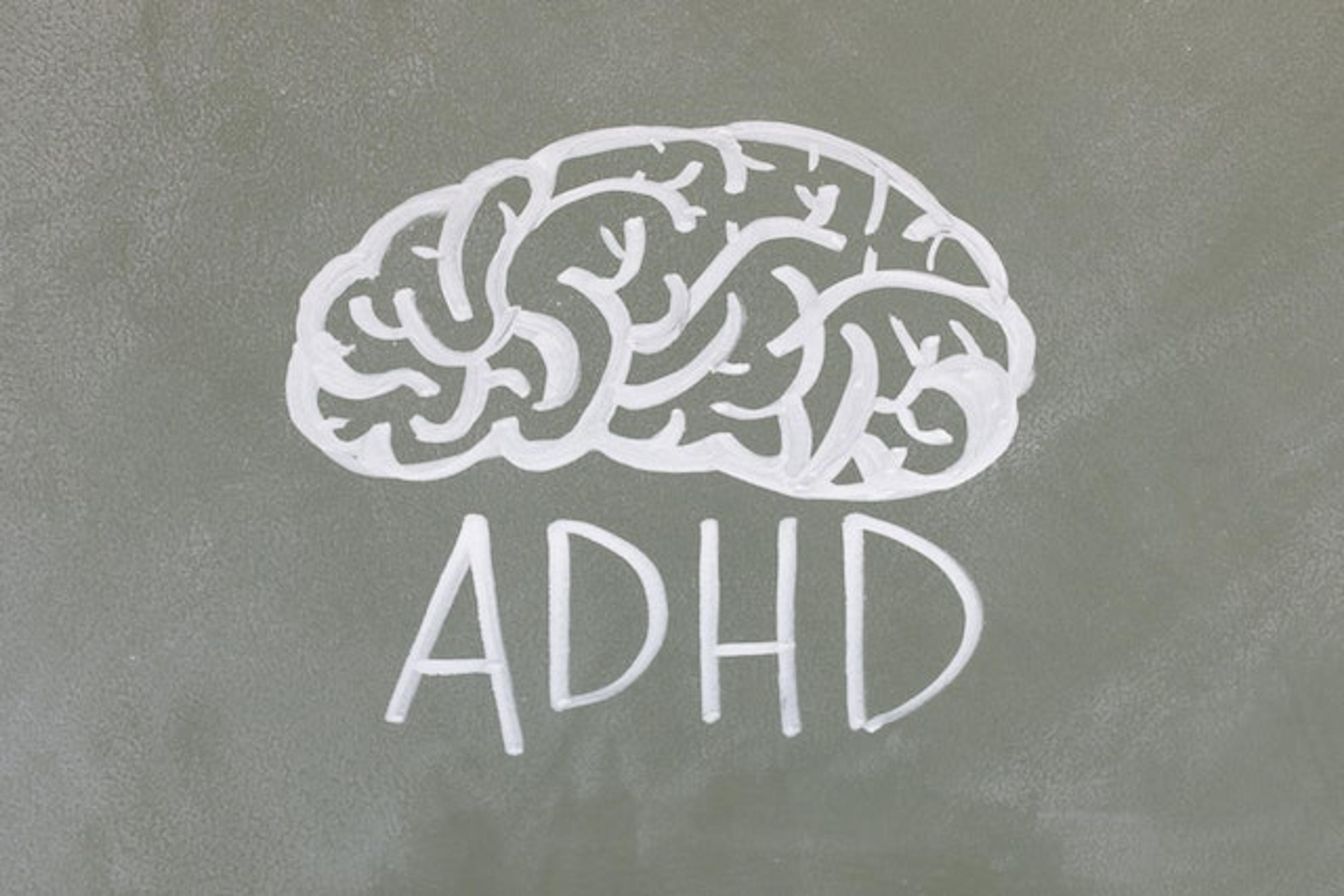 A painted brain and the text adhd, the picture is Illustrating adhd and relationship problems