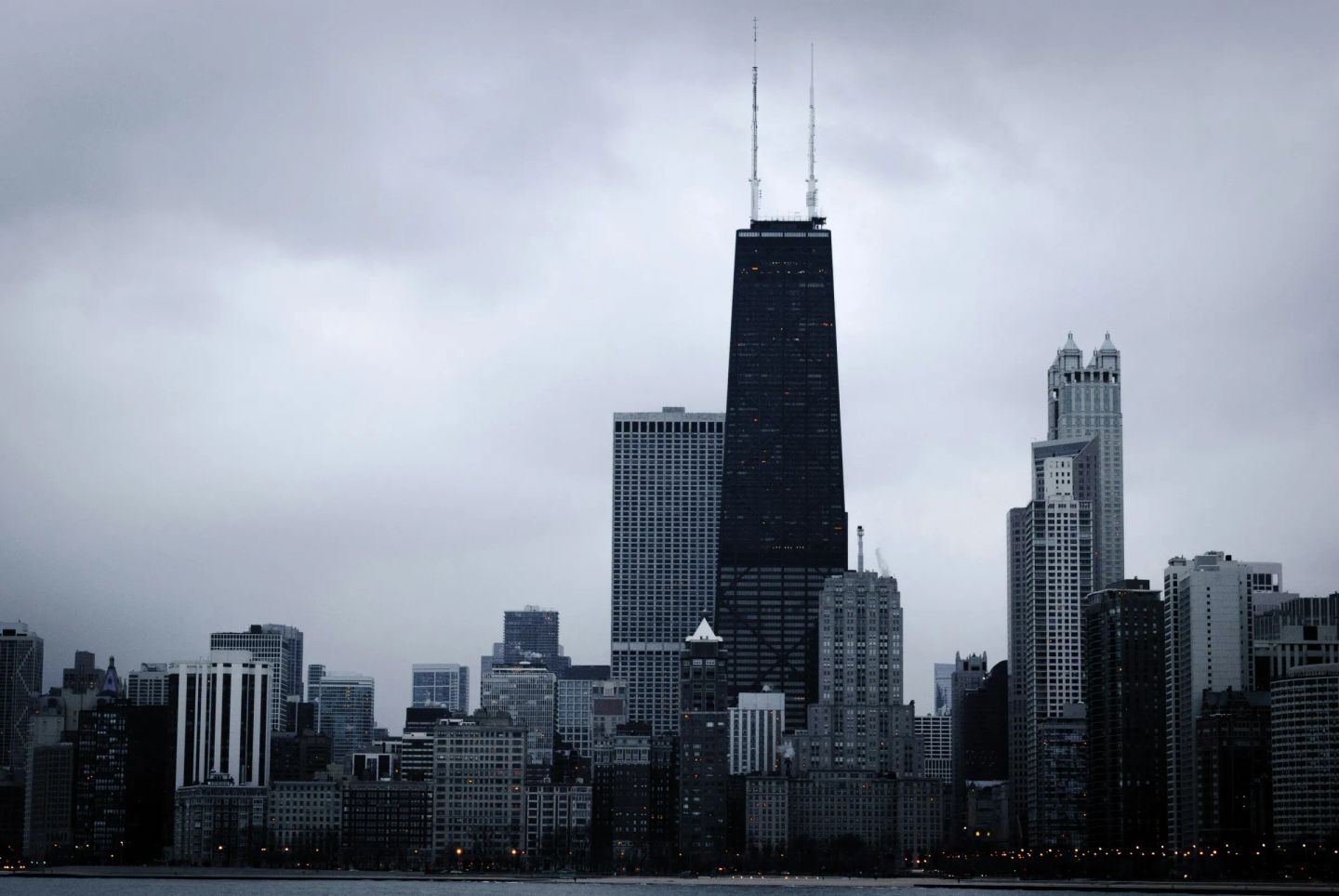 Wide-angle view of Chicago's skyline on a cloudy day, as seen from the Lakefront Trail.