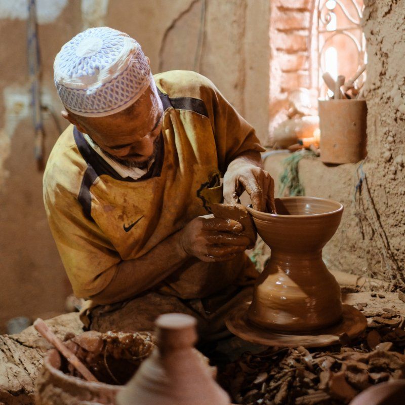 Potter working on a traditional wheel