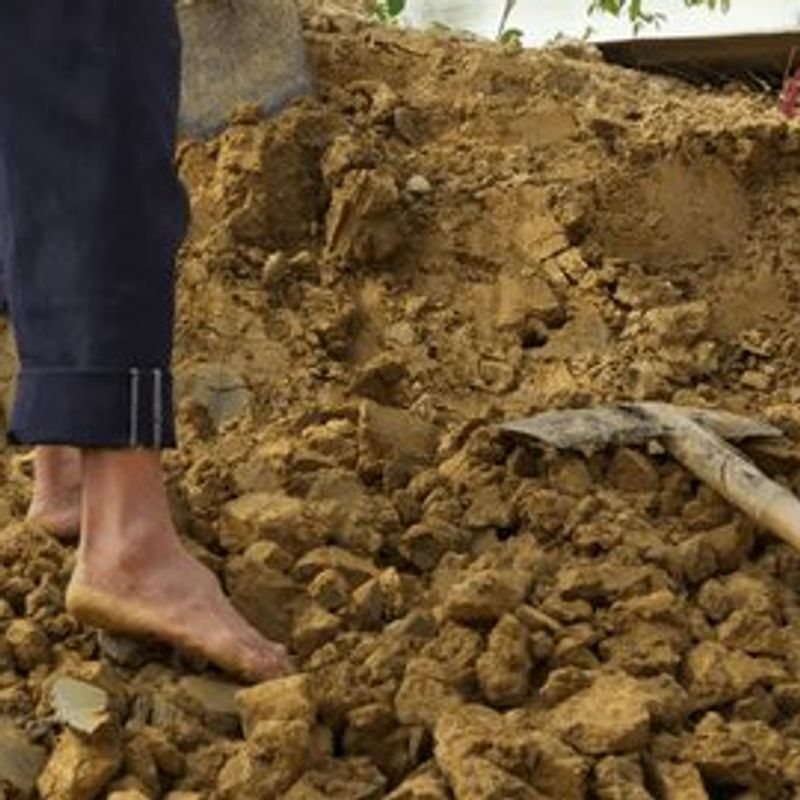 Clay being extracted from the earth