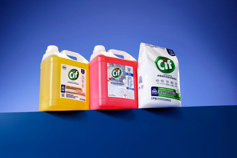 Three Cif professional cleaning products: yellow and red liquid jugs, and a white powder bag.