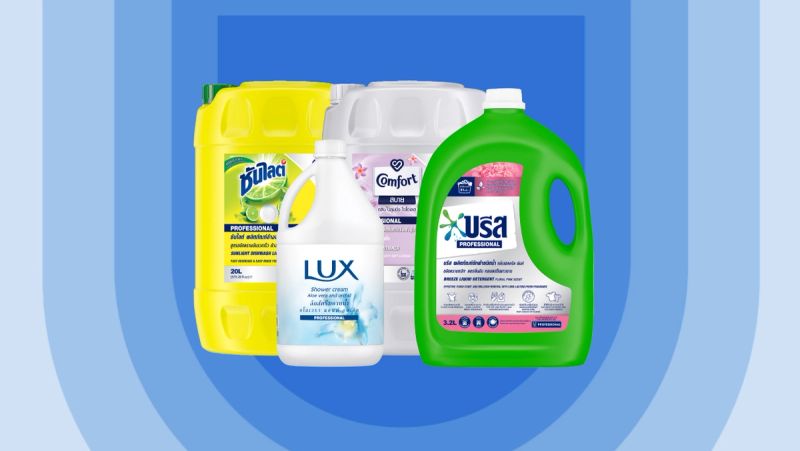 A group of four Unilever Professional cleaning product containers arranged against a blue shield background.