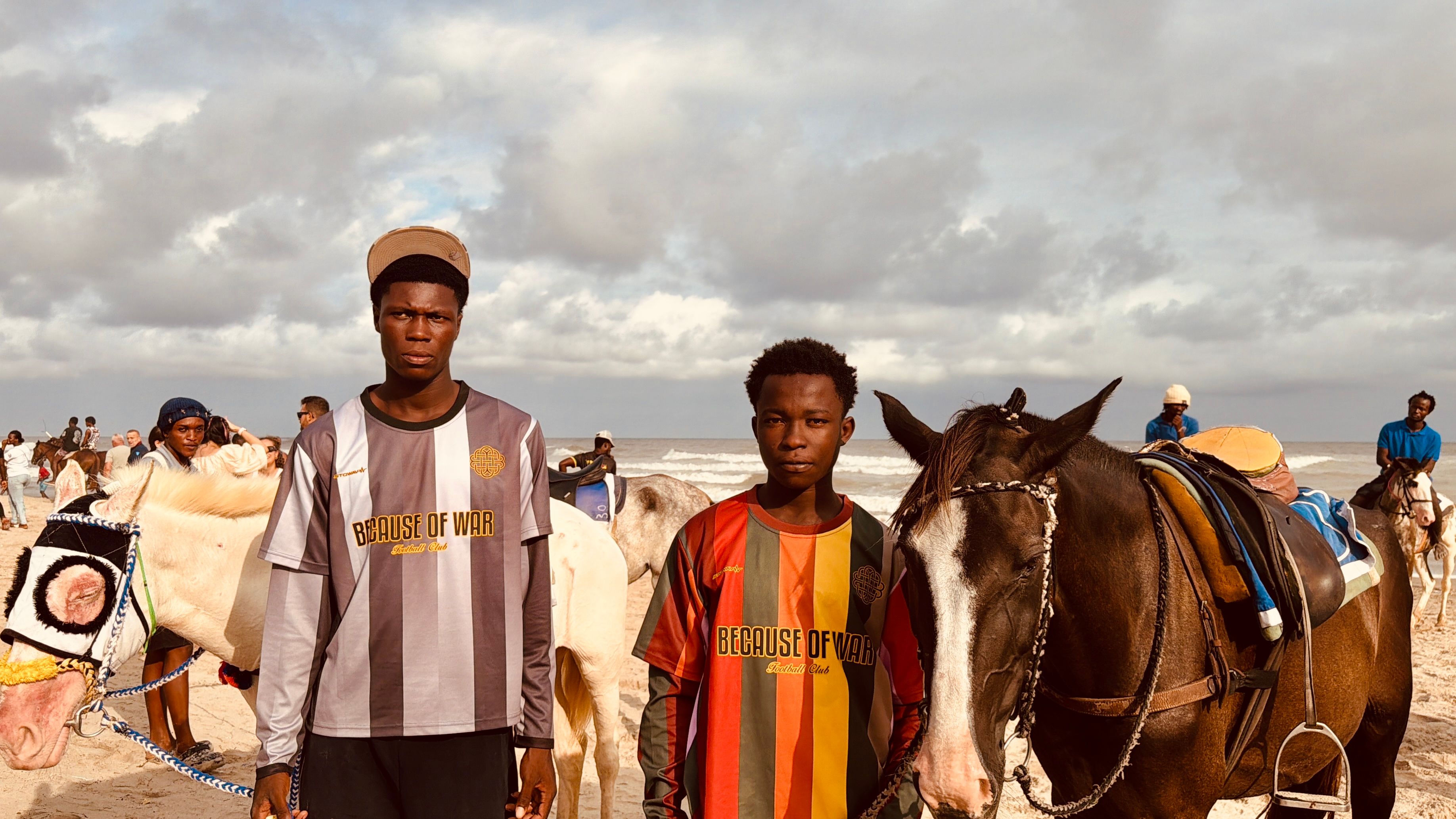 Two Models wearing Football jerseys from the Because of War Culture  collection