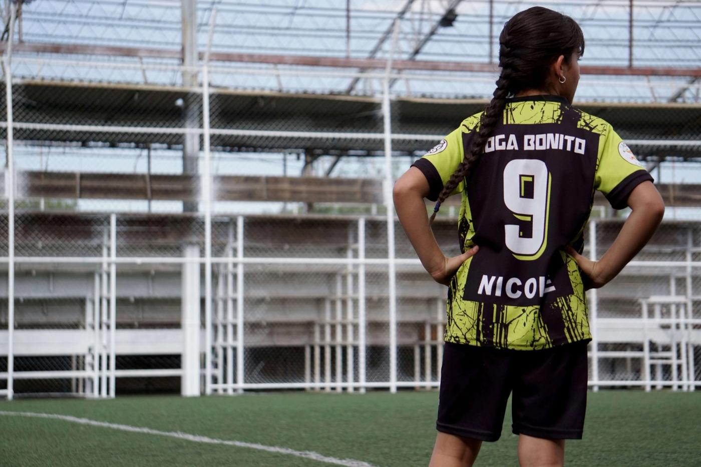 Girl Football Player with Joga Bonito Football Shirt