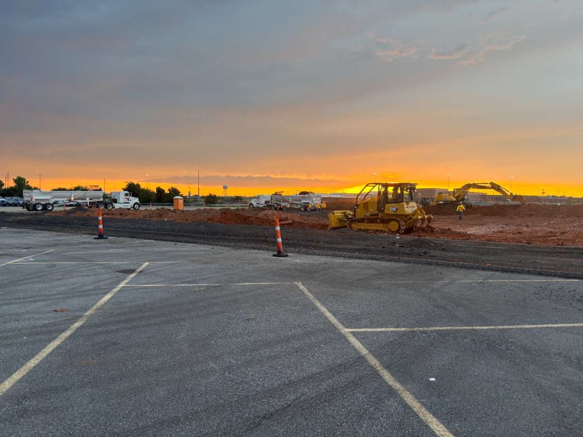 AAA Paving grading and preparing a commercial subgrade at sunrise