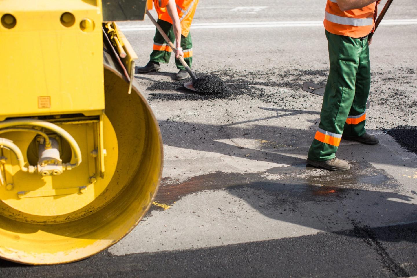 AAA Paving rollers compacting fresh asphalt on a Texas commercial paving project