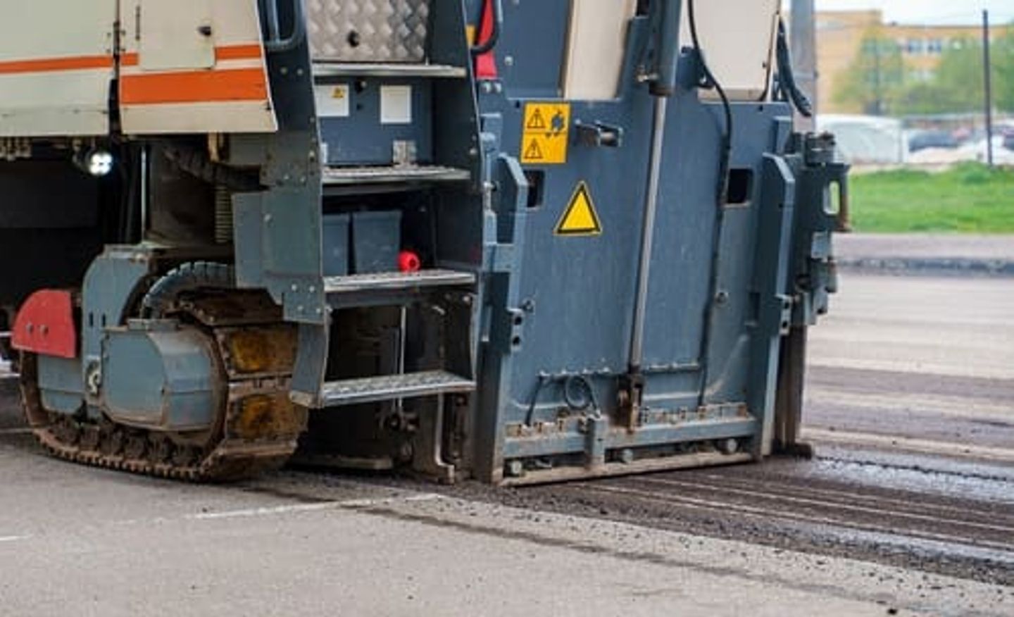 Asphalt milling machine working on the street.