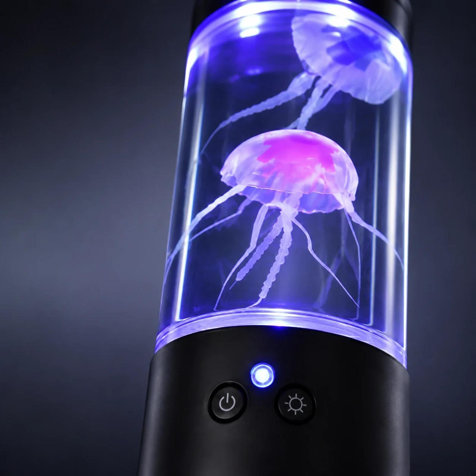 Close-up detail of MX-5013F jellyfish lamp showing the clear tank, floating jellyfish effect, black base, and front control buttons.