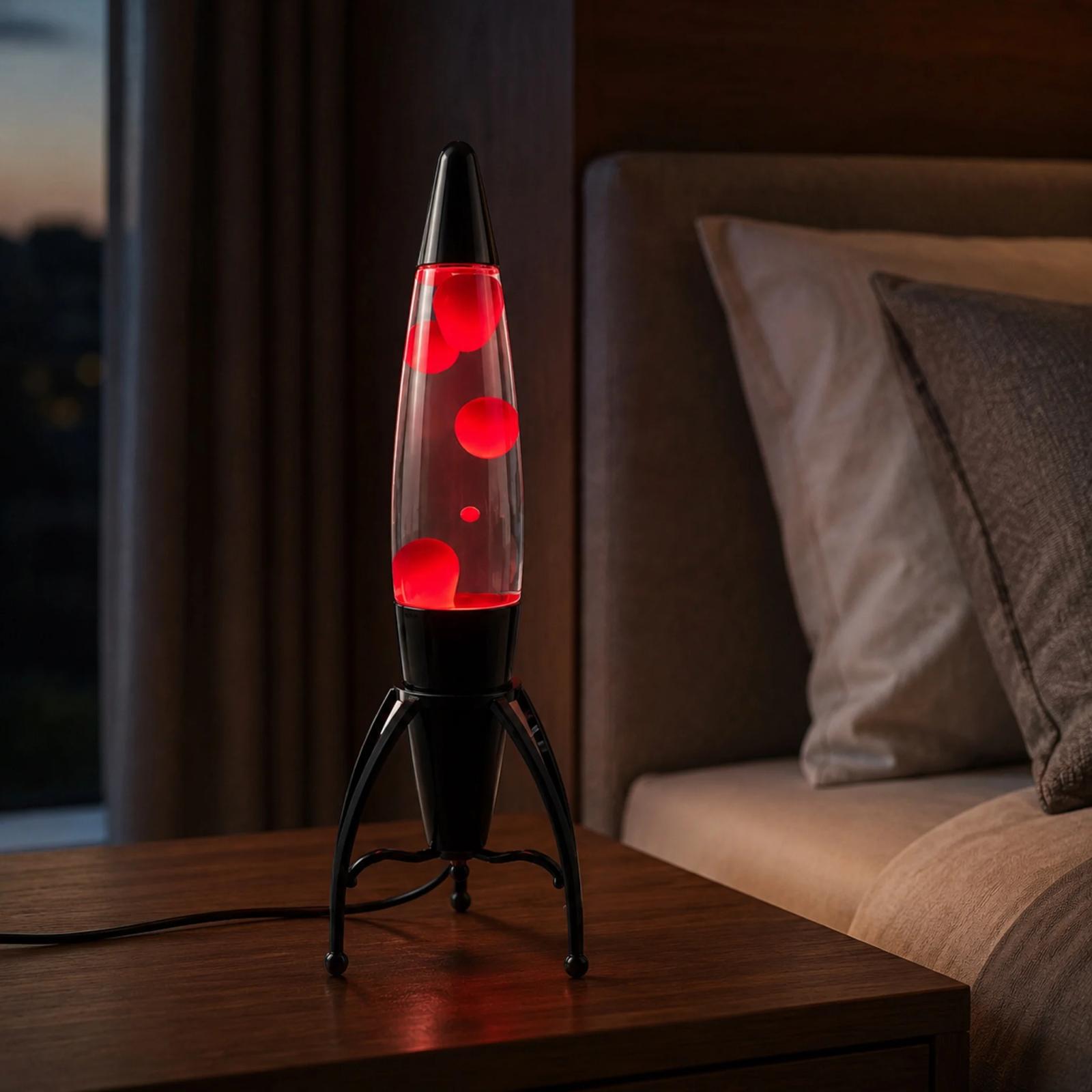 MX-3061 plastic rocket lava lamp glowing red on a modern bedroom side table