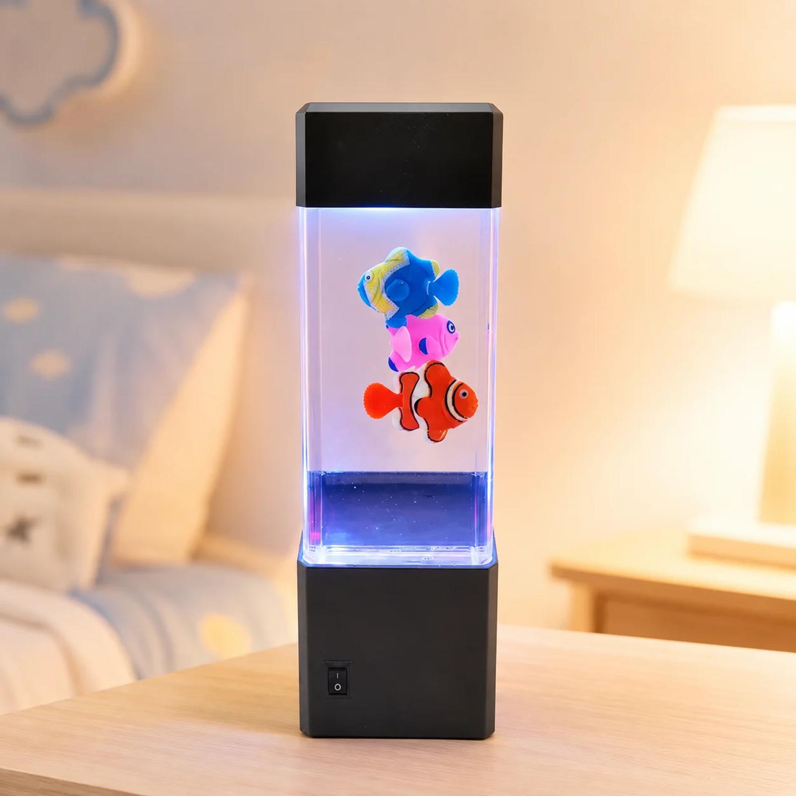 MX-5012 mini aquarium night light glowing on a bedside table in a warm kids bedroom scene.