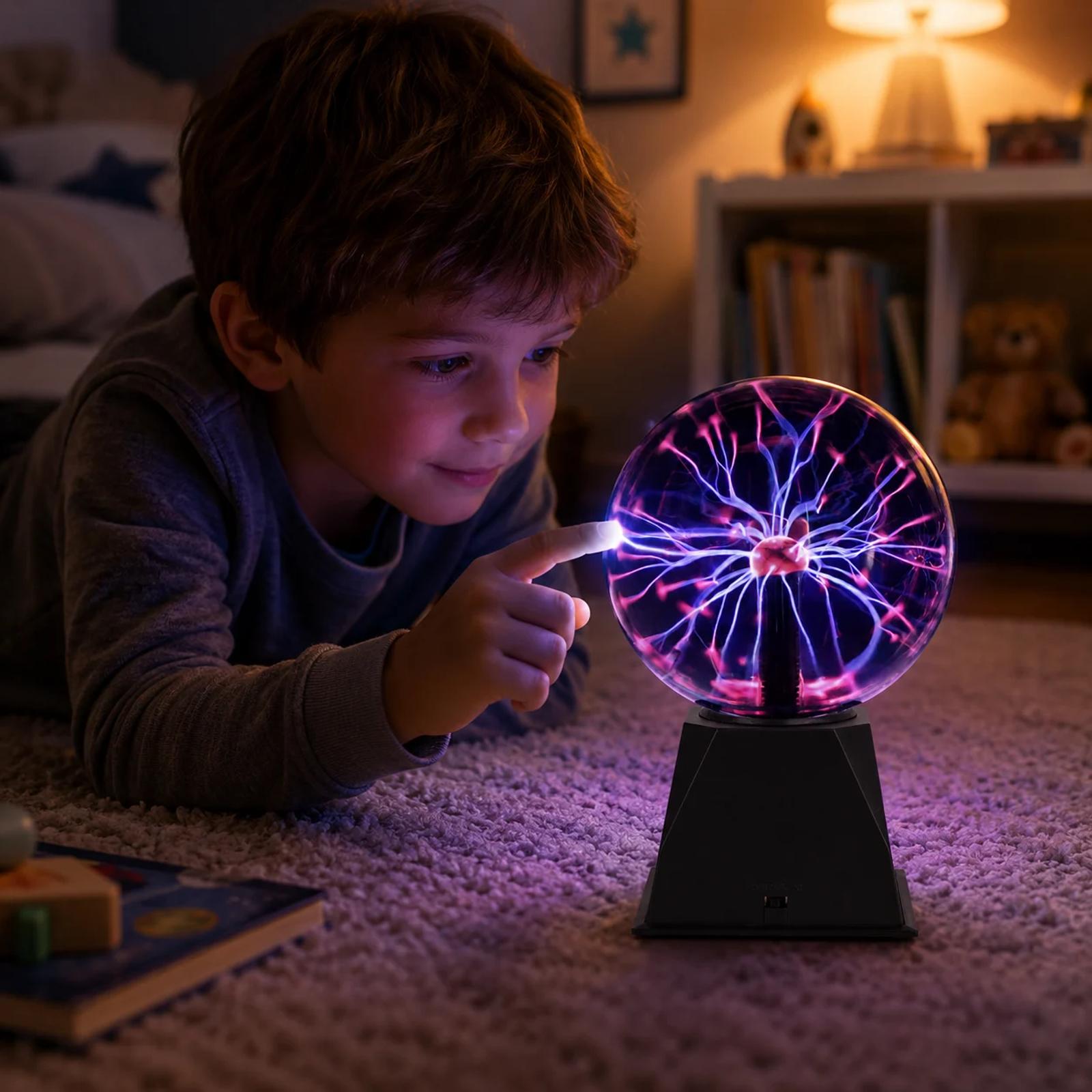 MX-7012 plasma ball LED night light in a children's bedroom scene with a child lying on the rug and touching the glass sphere as pink-blue plasma arcs gather toward the fingertip.