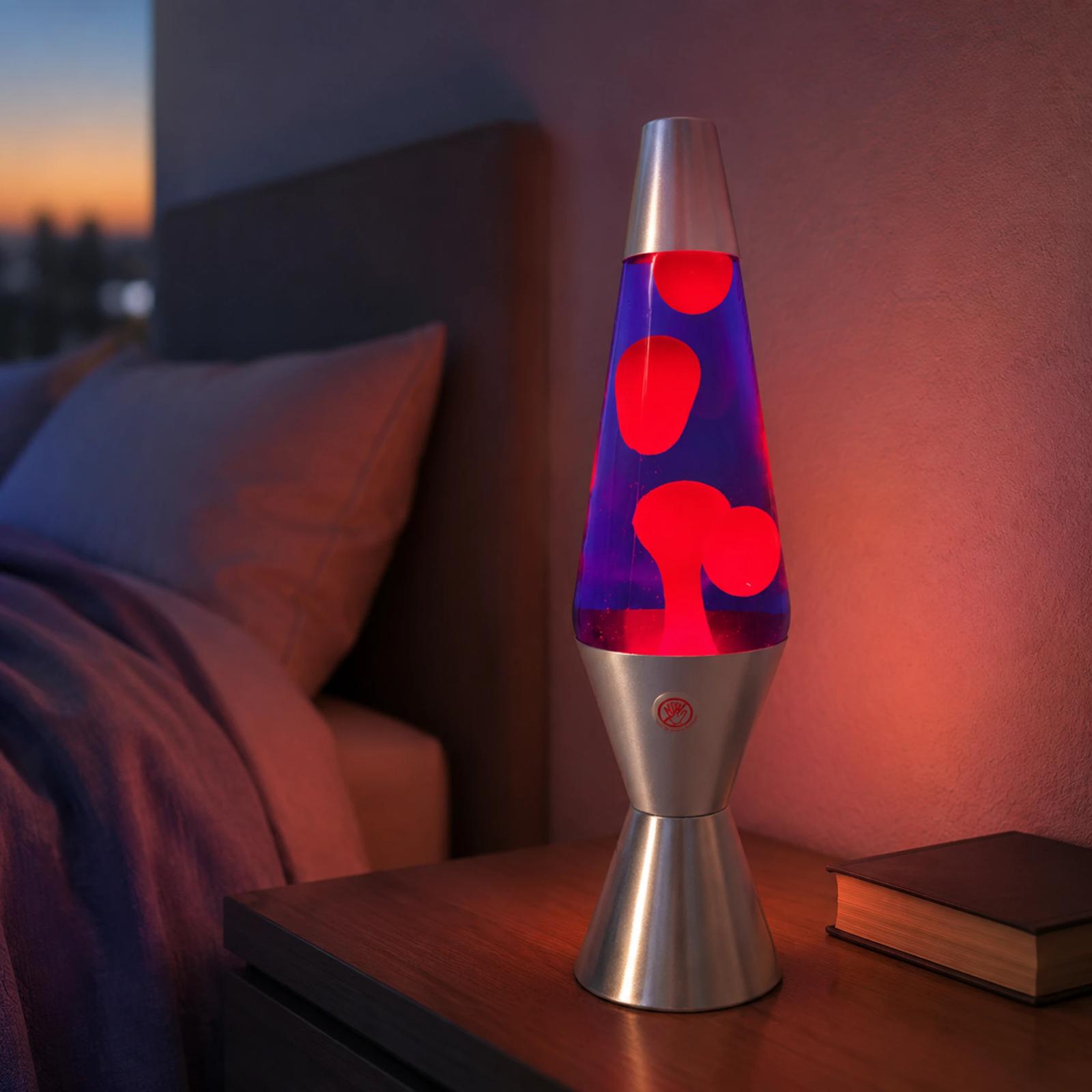 MX-3027 silver lava lamp glowing on a modern bedroom side table
