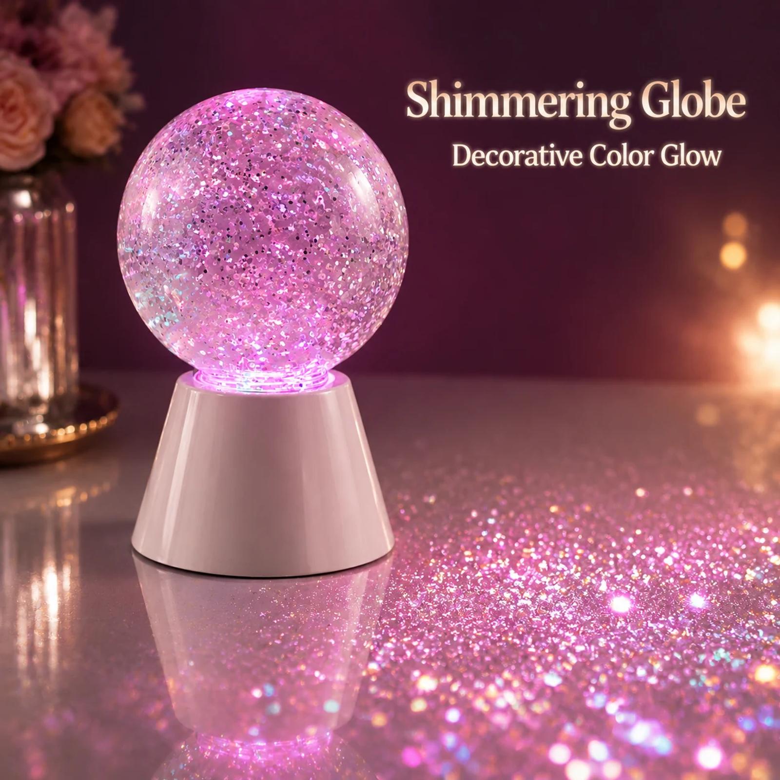 MX-3100G glitter ball decor lamp glowing pink on a table with sparkling light reflection