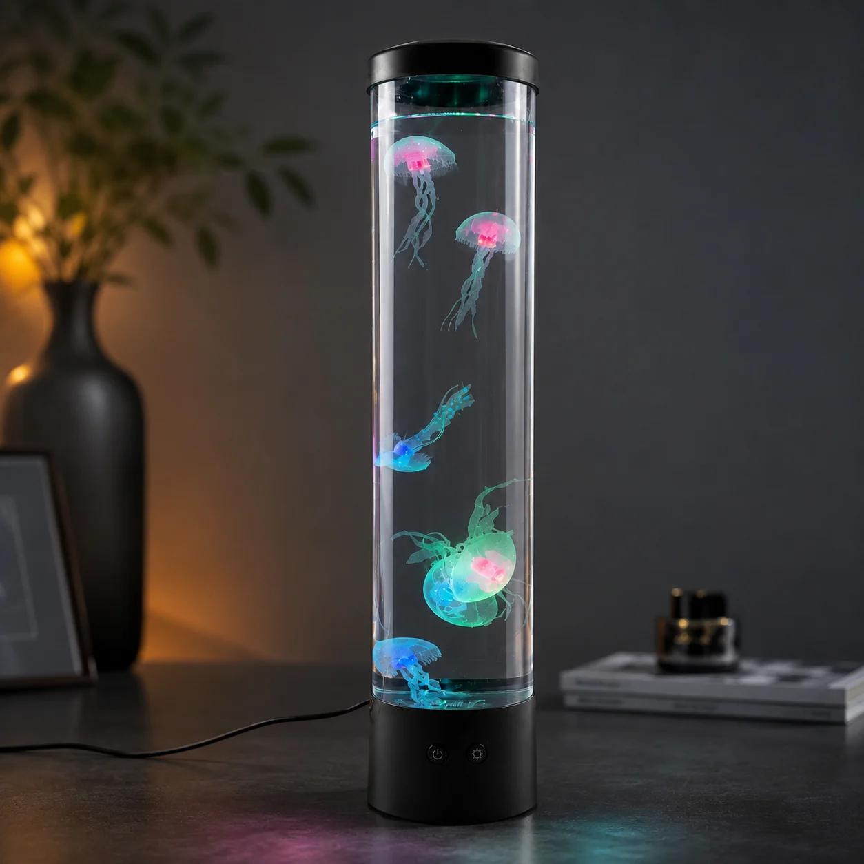 MX-5013B USB powered LED jellyfish lamp glowing on a dark tabletop with colorful simulated jellyfish.