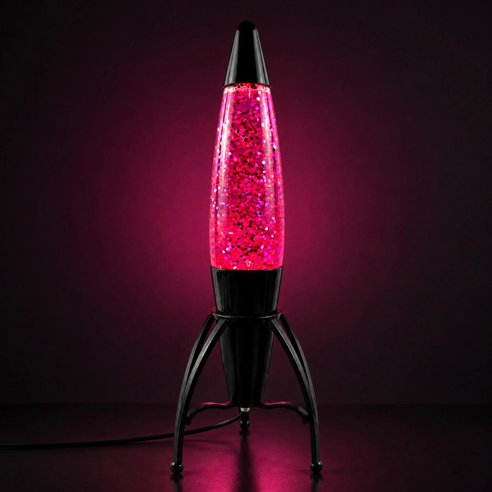 MX-3060 black rocket glitter lamp glowing pink against a dark plum studio background