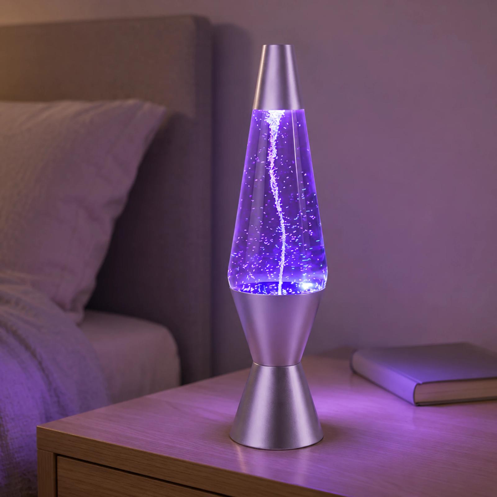 MX-3027T tornado vortex glitter lamp glowing violet on a bedroom side table