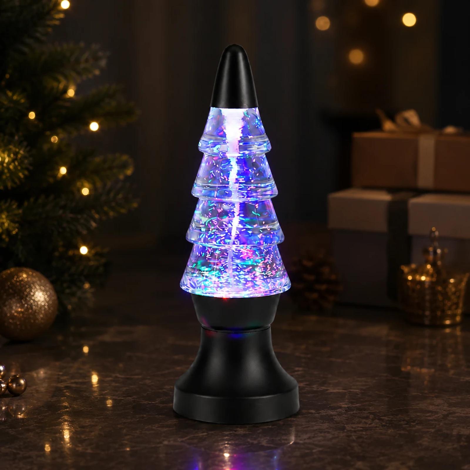 RGB Christmas tree water vortex night light glowing in a holiday tabletop scene