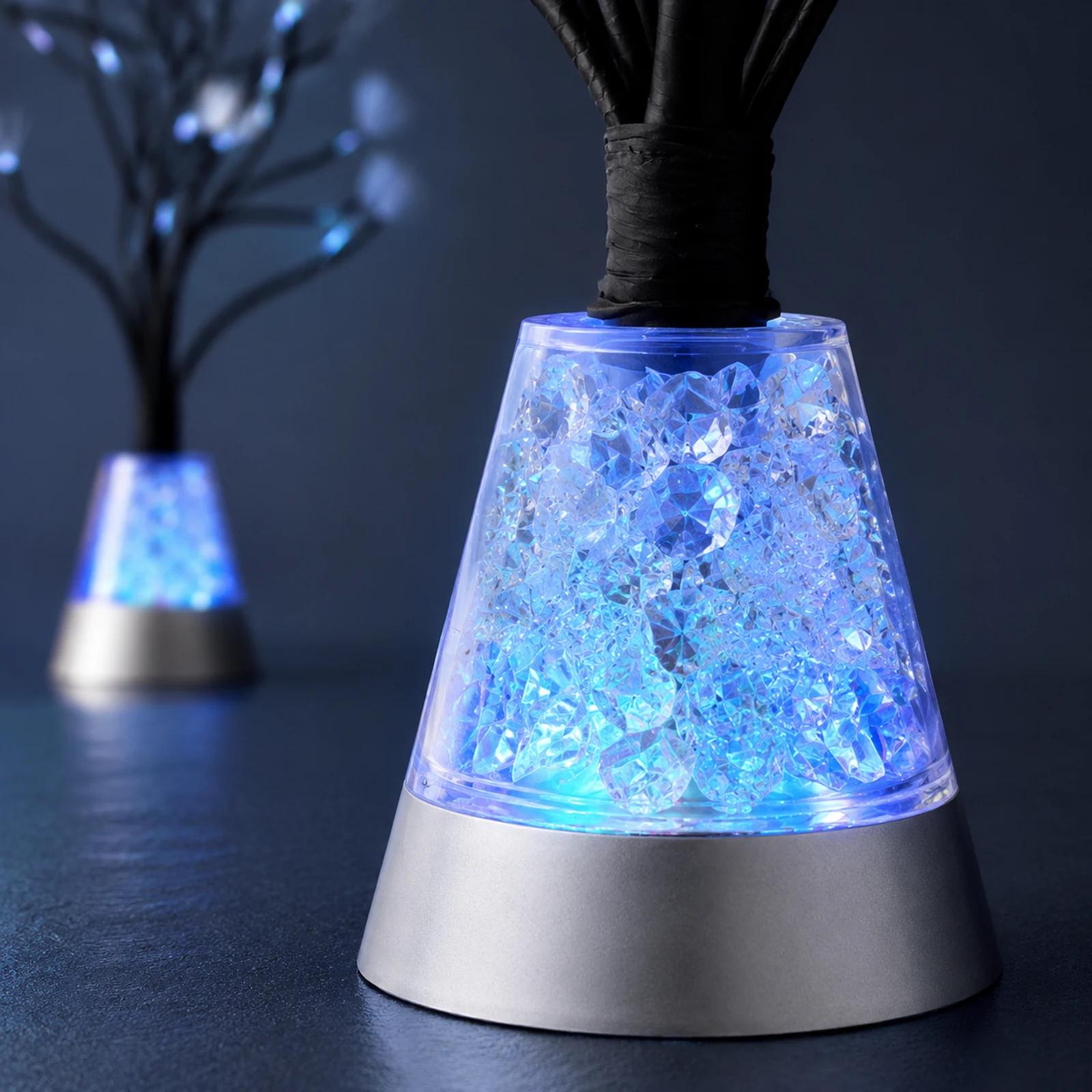 Close-up of the MX-1017 clear faceted crystal-look chamber and silver lamp base