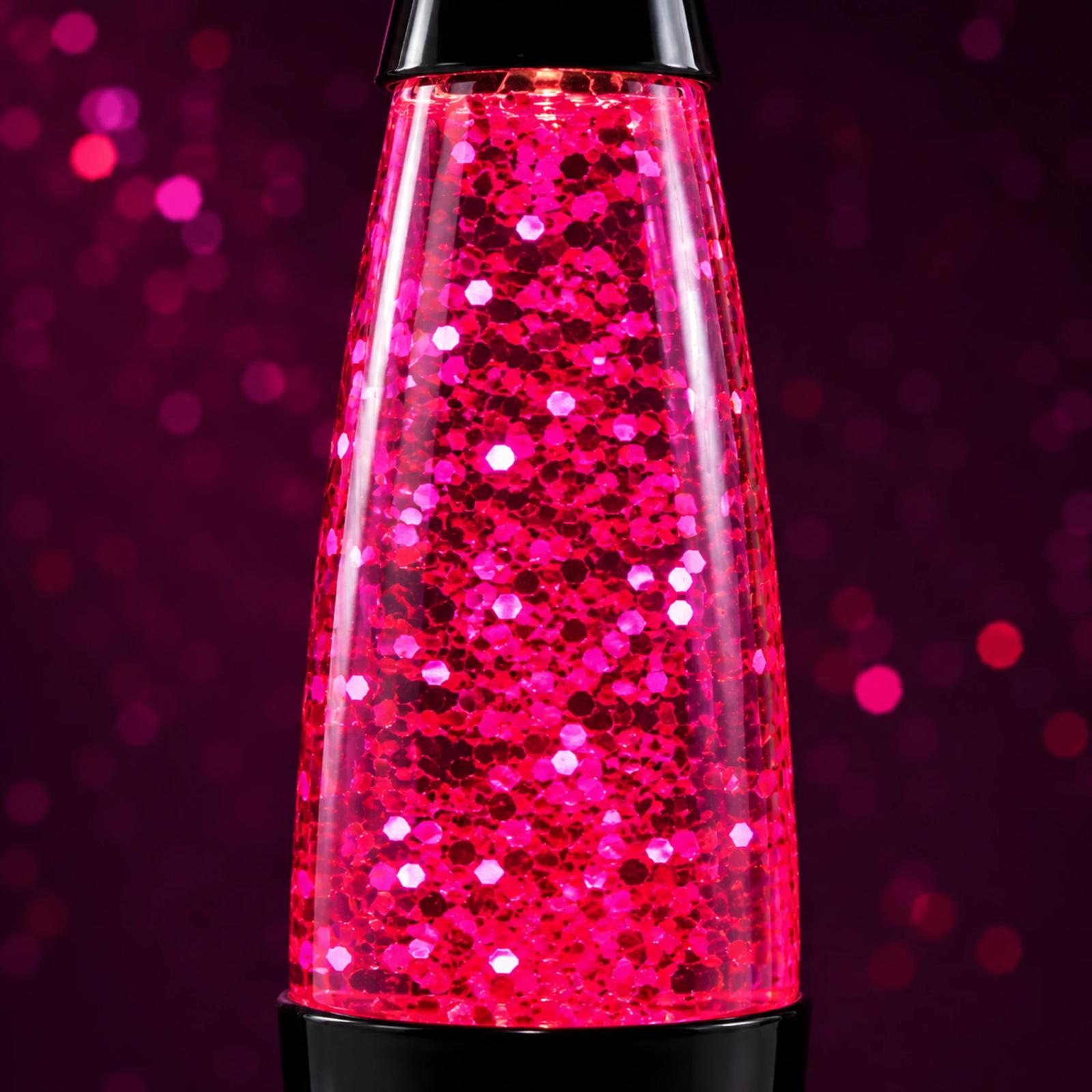 Close-up of pink polygonal glitter inside the transparent MX-3060 lamp chamber