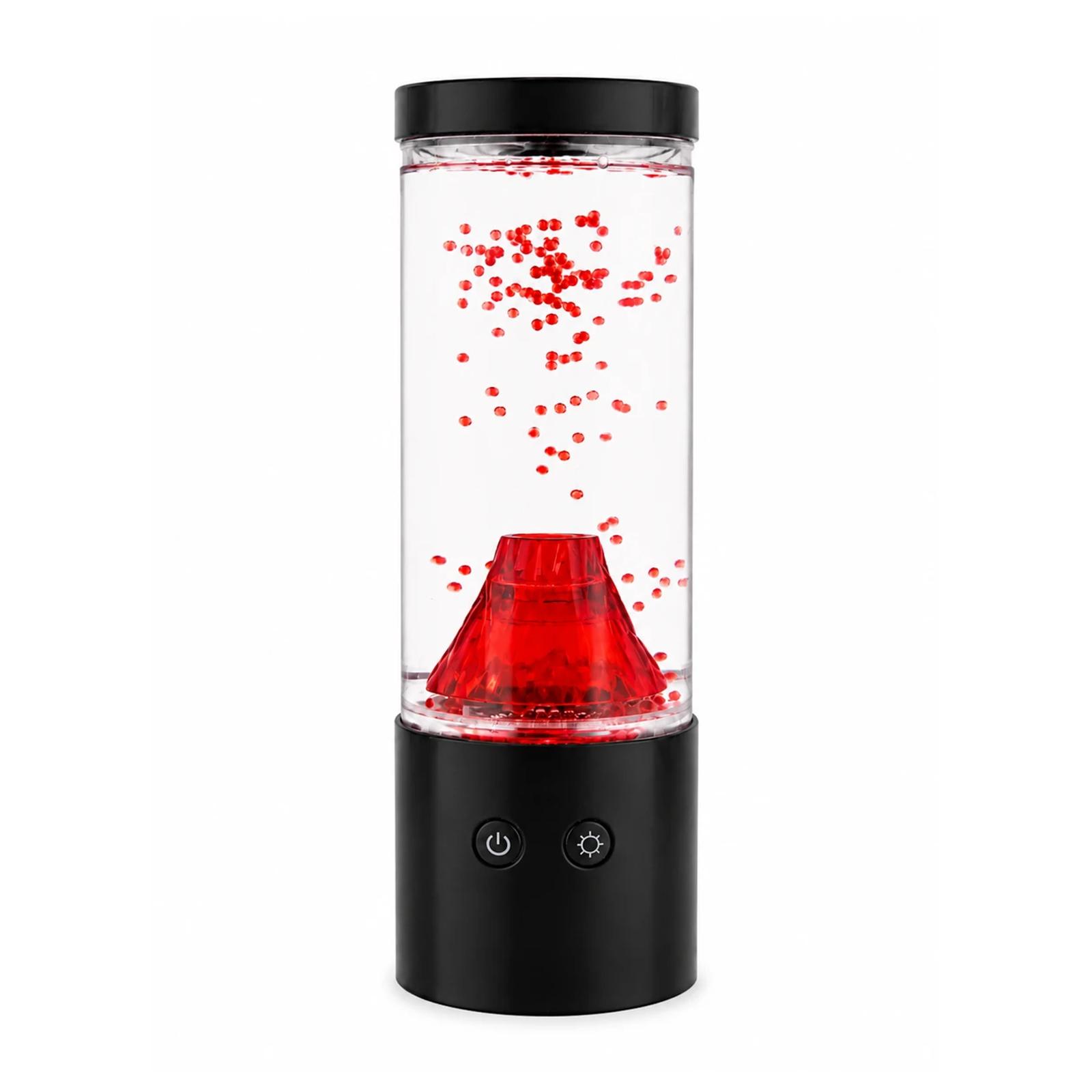 Front product view of MX-5015V plug-in volcano night light with a clear cylindrical tank, black base, and red volcano cone.