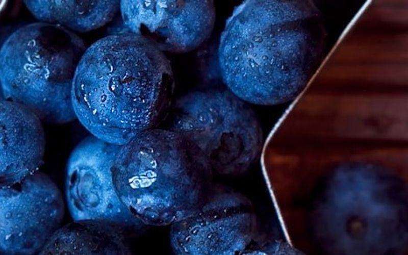 Fresh blueberries in a star-shaped bowl