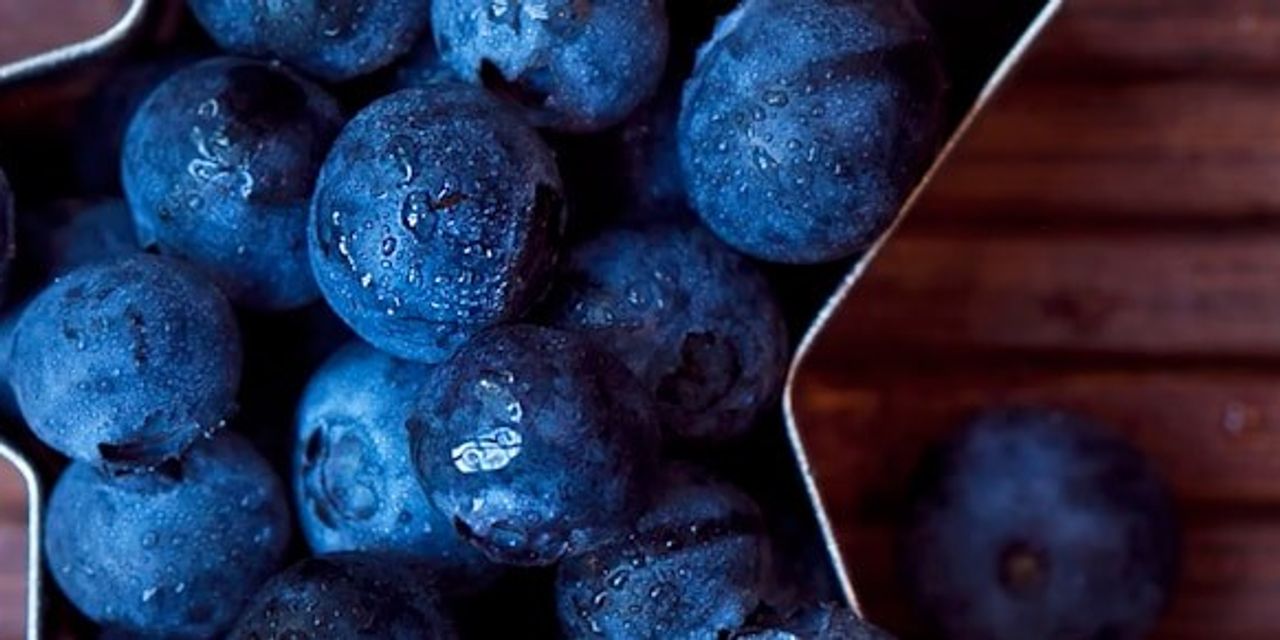 Fresh blueberries in a star-shaped bowl