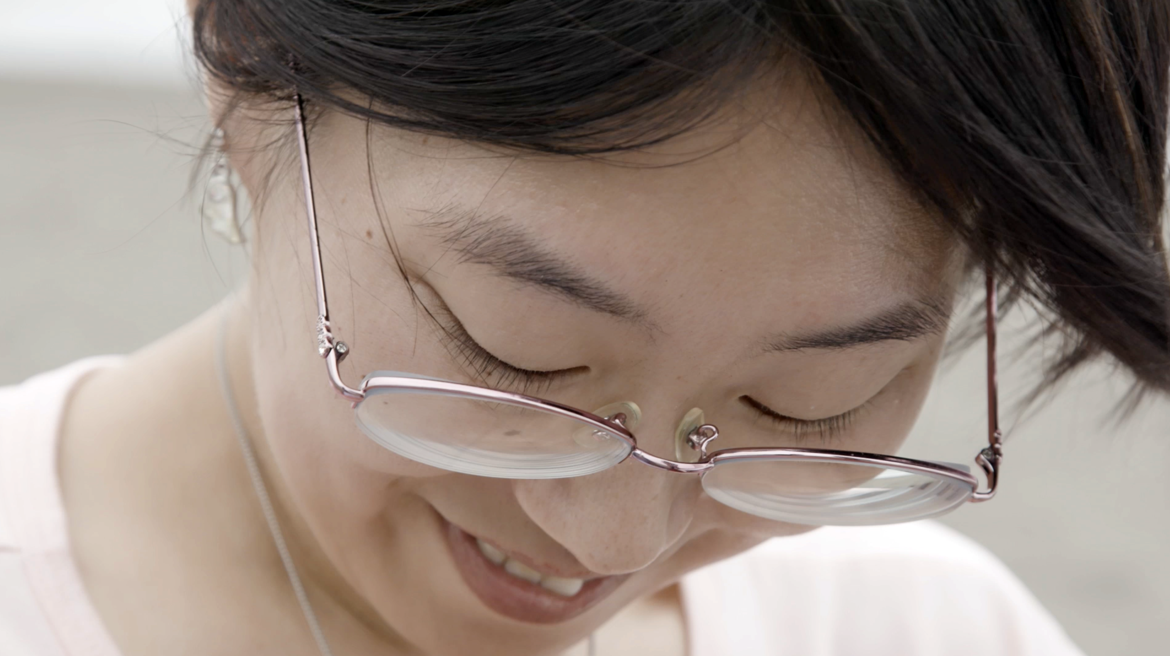 a close-up on a woman's smiling face