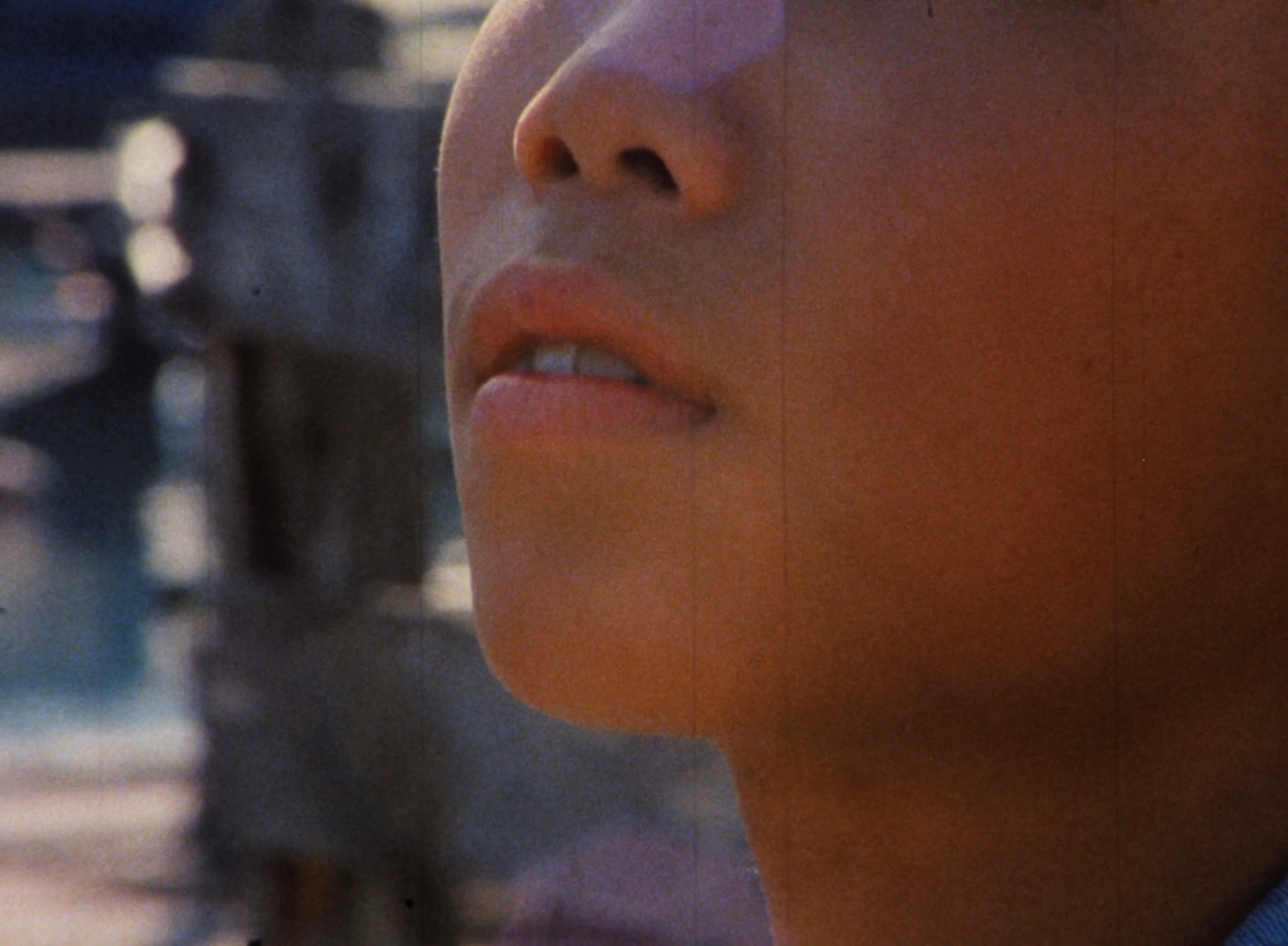 A man's face where only the nose and mouth are visible.