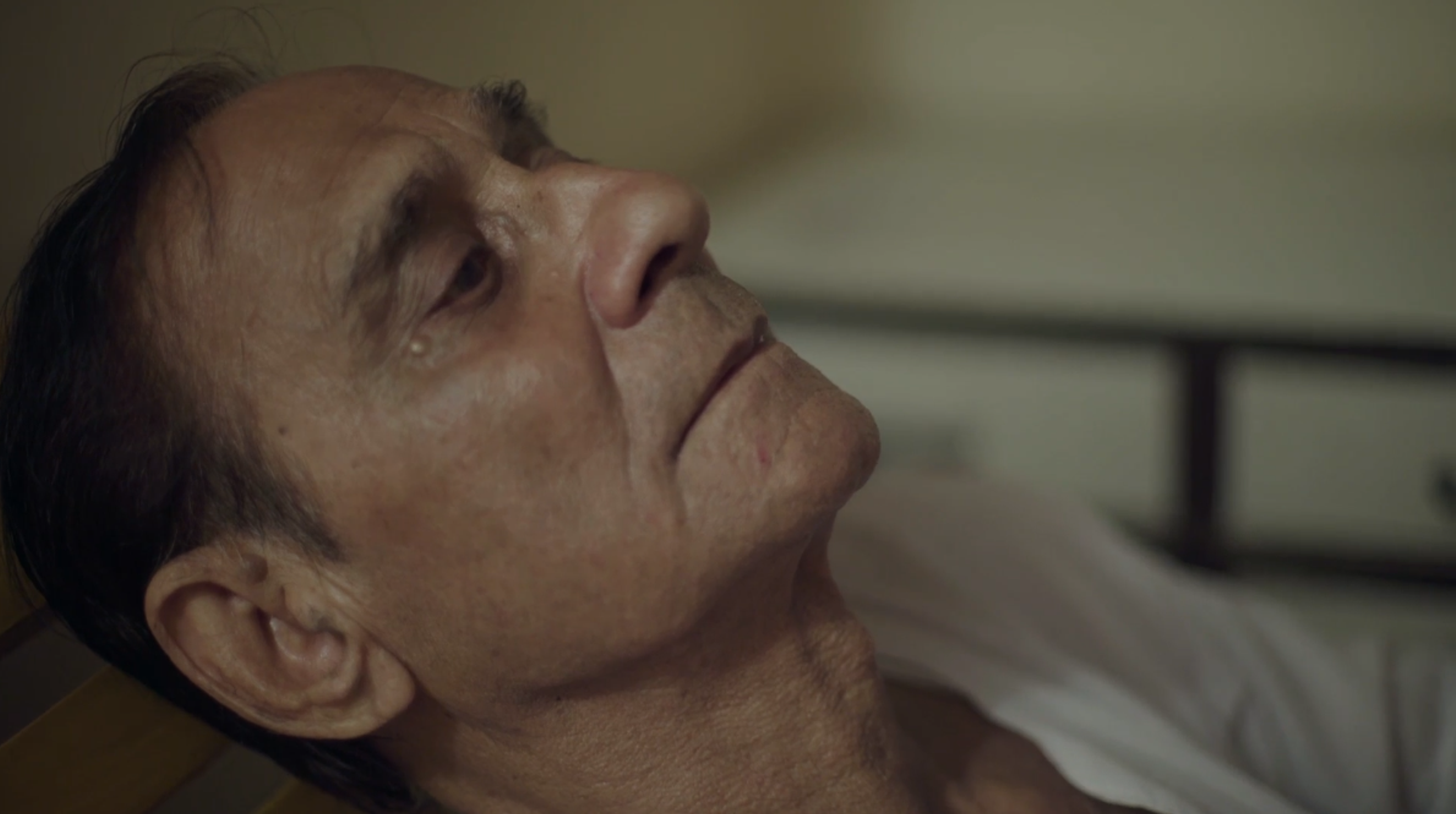 An elderly person's side profile