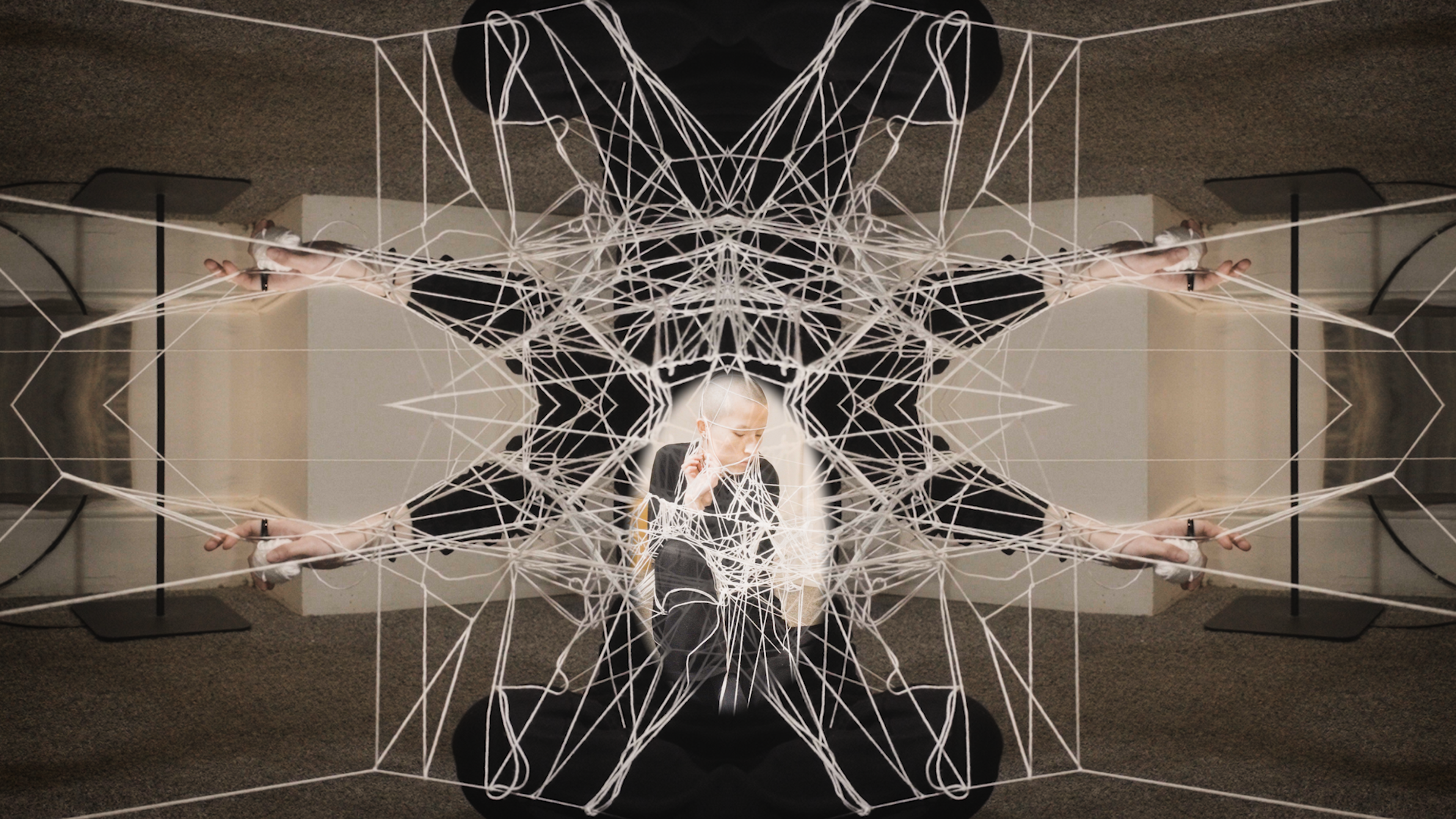 A complex web of knots and limbs.