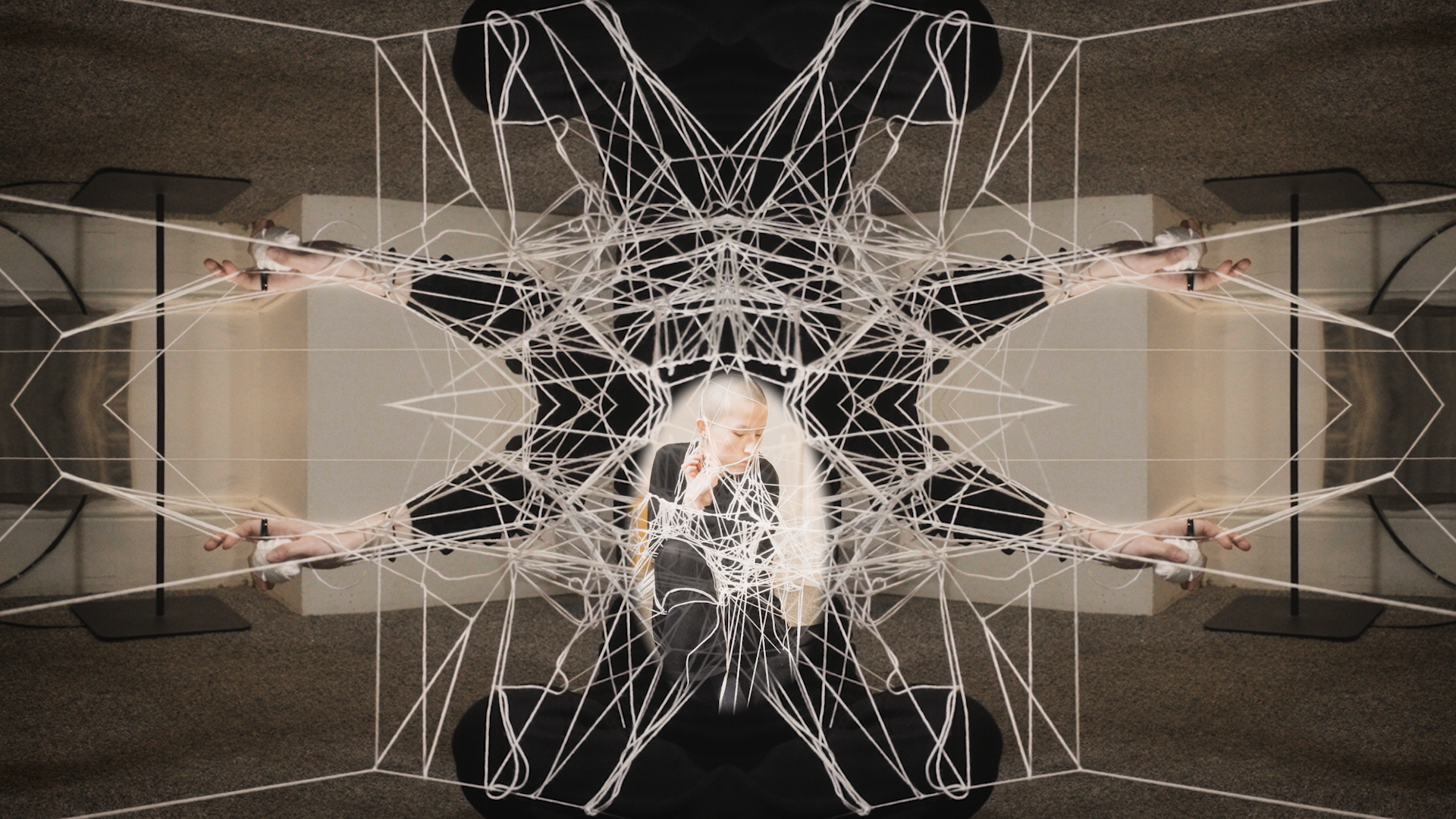 A complex web of knots and limbs.