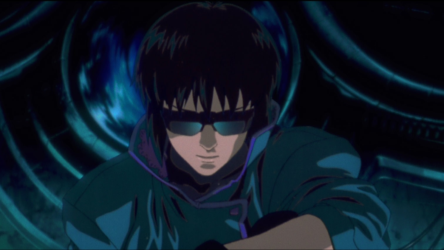 An animated woman with spiky black hair and sunglasses.