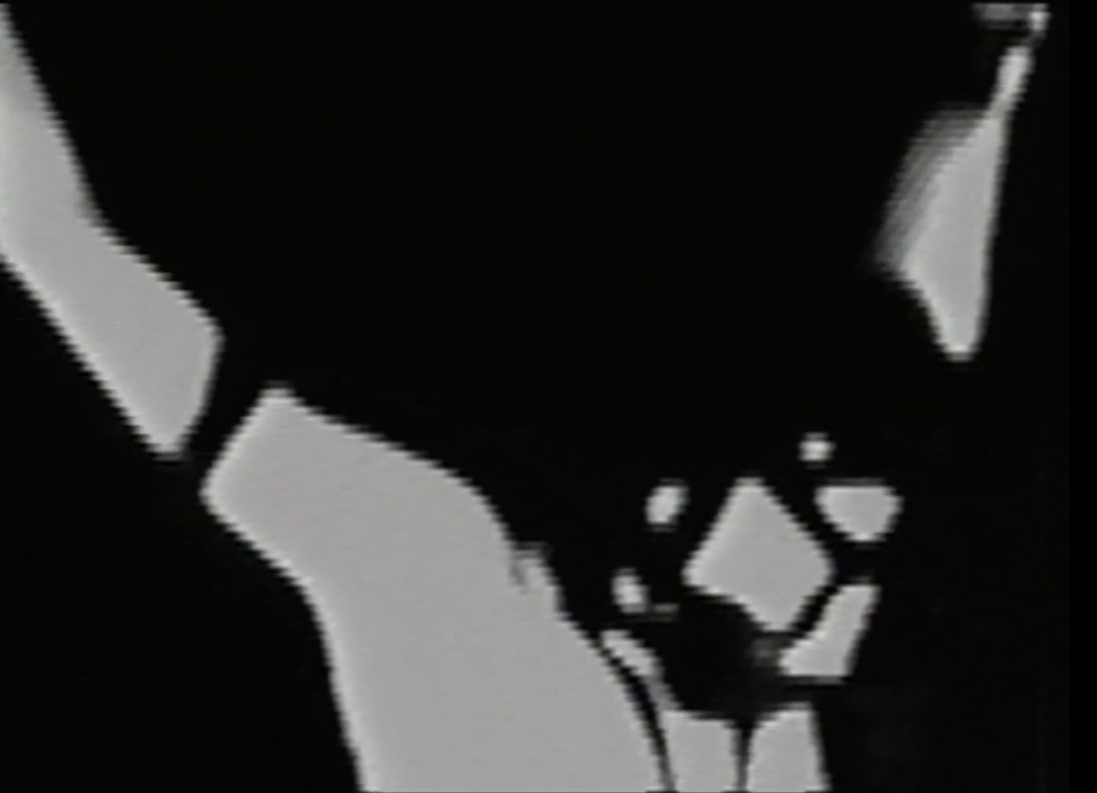 The torso of a figure with their arms stretched out.