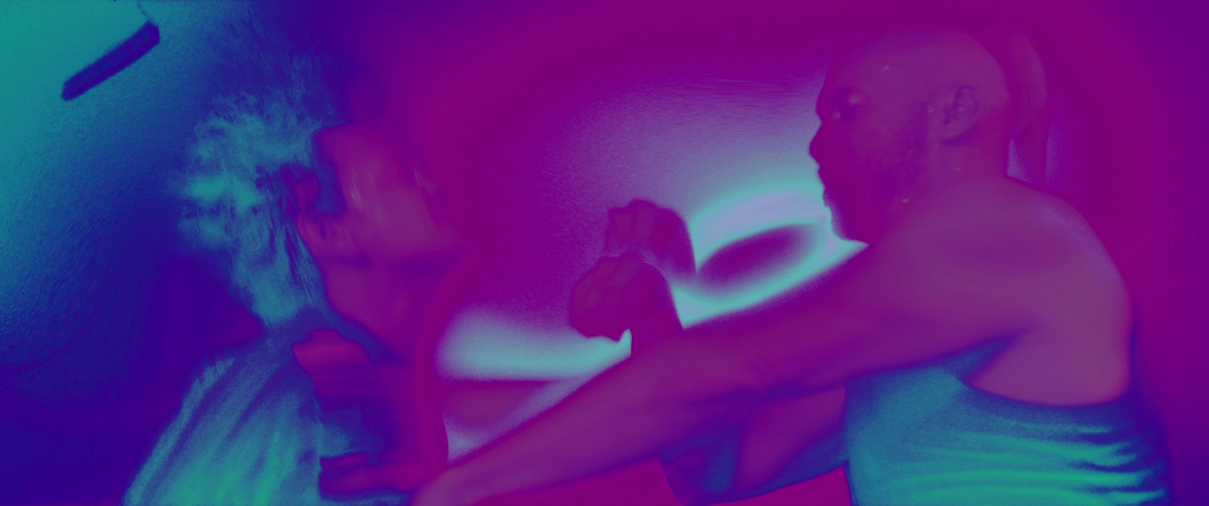 Two figures hold each other.